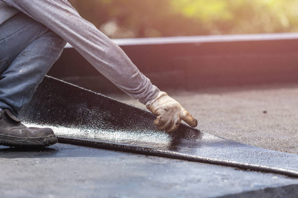 Professional Emergency Waterproofing technician working in Woodbury, MN
